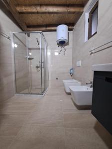 Koupelna v ubytování Hotel Demaj