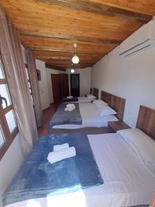Postel nebo postele na pokoji v ubytování Hotel Demaj