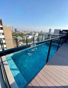 a swimming pool on the roof of a building at Apart. 1 Dorm Equipetrol Nanotec in Santa Cruz de la Sierra