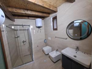 Koupelna v ubytování Hotel Demaj