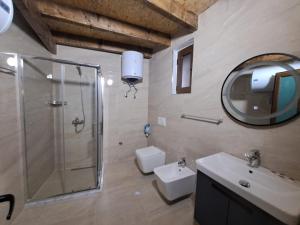 Koupelna v ubytování Hotel Demaj