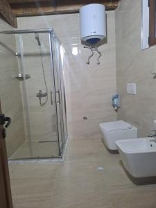 Koupelna v ubytování Hotel Demaj