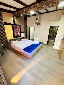 Postel nebo postele na pokoji v ubytování Hotel Lares 70 Laureles