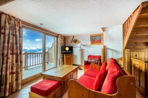 Televízia a/alebo spoločenská miestnosť v ubytovaní Résidence Les Alpages de Chantel - maeva Home - Appartement duplex 3 Pièces 6 Personnes - Sélection MAE-1638