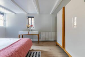 Postel nebo postele na pokoji v ubytování Gîte de l'étoile Achenheim 3 chambres - jacuzzi