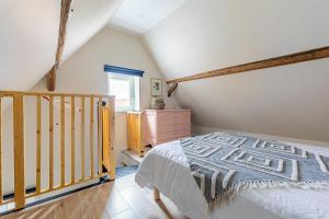 Postel nebo postele na pokoji v ubytování Gîte de l'étoile Achenheim 3 chambres - jacuzzi