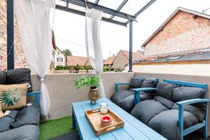 Posezení v ubytování Gîte de l'étoile Achenheim 3 chambres - jacuzzi