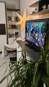 Et tv og/eller underholdning på Peni Apartman Centar