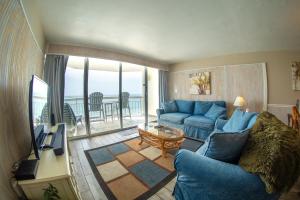 TV a/nebo společenská místnost v ubytování Beautiful Oceanfront Condo 505