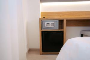Postel nebo postele na pokoji v ubytování Hotel Everest