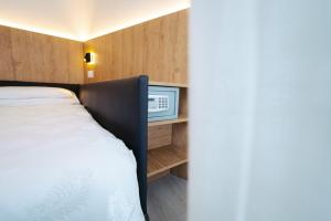 Postel nebo postele na pokoji v ubytování Hotel Everest