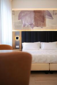 Postel nebo postele na pokoji v ubytování Hotel Everest