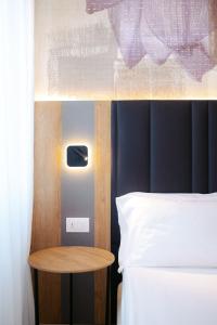 Postel nebo postele na pokoji v ubytování Hotel Everest