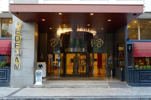 an entrance to a building with a revolving door at Dedeman Istanbul in Istanbul