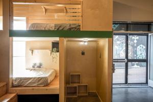 two photos of a room with a bunk bed at PodShare Hollywood in Los Angeles