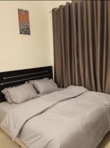Llit o llits en una habitació de TSR HOMES
