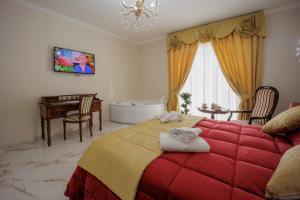 Postel nebo postele na pokoji v ubytování REDDIMUS Guest House