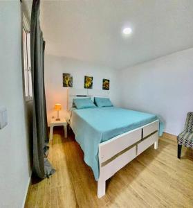 Postel nebo postele na pokoji v ubytování Villa Tortuga Constanza
