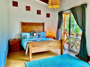 Postel nebo postele na pokoji v ubytování Villa Tortuga Constanza