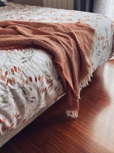 Ένα ή περισσότερα κρεβάτια σε δωμάτιο στο Apartamento Hogar del Nómada