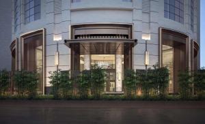 a facade of a building with a large entrance at Yuexiu Hotel Guangzhou Curio Collection By Hilton, Free Shuttle during Canton Fair in Guangzhou
