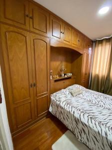 Postel nebo postele na pokoji v ubytování Seu lar na Serra