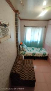 Cama o camas de una habitación en 3Js Place 30-mins from Tagaytay