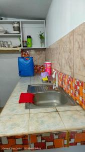 Η κουζίνα ή μικρή κουζίνα στο 3Js Place 30-mins from Tagaytay