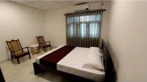 Cama ou camas em um quarto em Kottawa Luxury Holiday Home