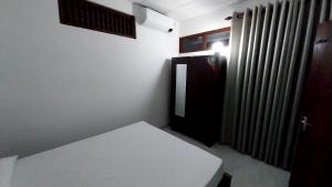 Ліжко або ліжка в номері Kottawa Luxury Holiday Home