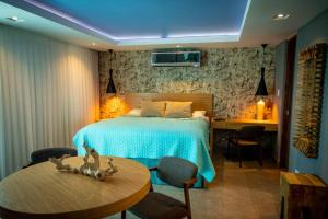 Postel nebo postele na pokoji v ubytování Enchanted 8 Jewel Luquillo Beachfront - Pool