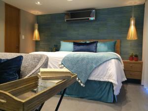 Postel nebo postele na pokoji v ubytování Enchanted 17 Jewel Beachfront Luquillo -Pool + 29 fotografií
