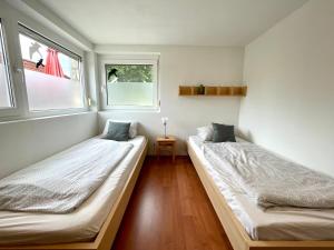 Postel nebo postele na pokoji v ubytování Belle Vue