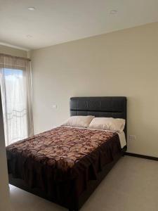 Postel nebo postele na pokoji v ubytování Hermoso departamento amplio