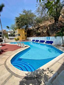 Swimmingpoolen hos eller tæt på Hermoso Departamento Frente Al Mar & Sobre Costera