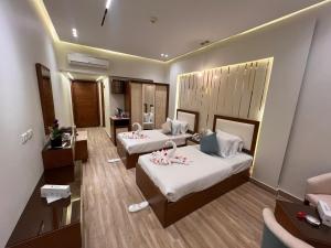 Voodi või voodid majutusasutuse Ramage Hotel & Resort toas