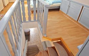 an overhead view of a staircase with a stair case at Ferienhaus Kummerow in Kummerow +14 photos