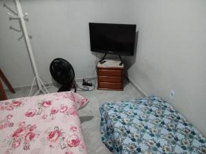 Billede fra billedgalleriet på Quarto,cozinha,banheiro e área externa compartilhada i Araruama