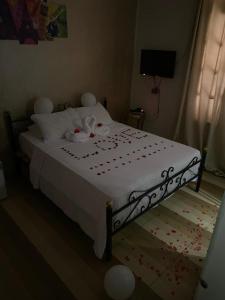 Voodi või voodid majutusasutuse Meramees Hotel toas