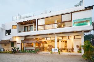 a large white building with a lot of windows at Seaworthy Boracay in Boracay
