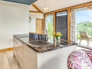 a kitchen with a sink and a counter at Oak View in Highgate