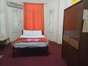 Voodi või voodid majutusasutuse Meramees Hotel toas