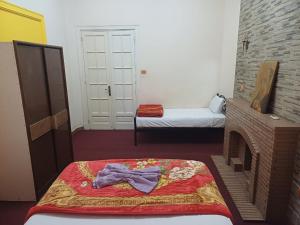 Voodi või voodid majutusasutuse Meramees Hotel toas