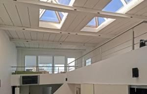 a room with skylight ceilings and white walls at Amazing Home In Neubrandenburg With Wifi in Neubrandenburg