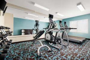 a gym with treadmills and elliptical machines at Fairfield Inn Concord in Concord
