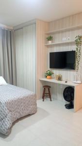 TV/trung tâm giải trí tại Condomínio da Fé