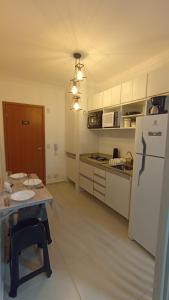 Nhà bếp/bếp nhỏ tại Condomínio da Fé