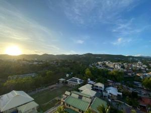 an aerial view of a city with the sun setting at Cloud9Condos Cebu 1 BR with Balcony in Cebu City