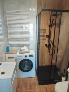 Kúpeľňa v ubytovaní Apartament Perła Kutna