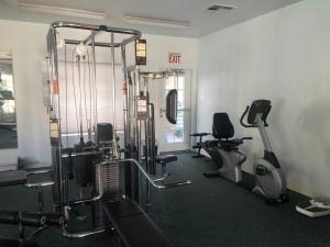 a gym with several treadmills and exercise bikes at The Healing Place in Laughlin